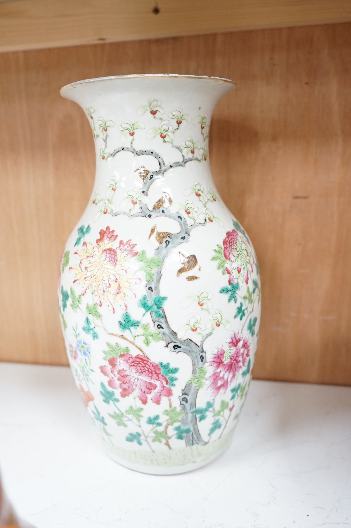 A mid 19th century Chinese famille rose vase together with other oriental and African wares, largest 33cm high. Condition - varies